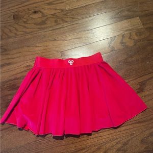 Fuschia TNA tennis skirt